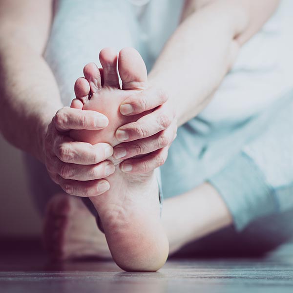 Man with pain in foot