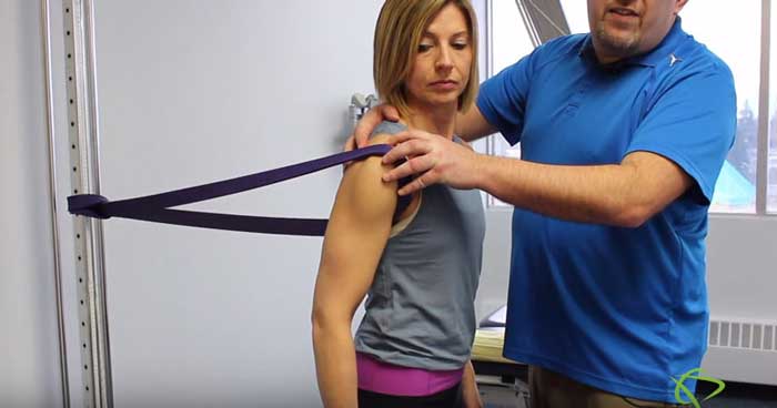 Shoulder Capsular stretches using exercise band for Edmonton patients